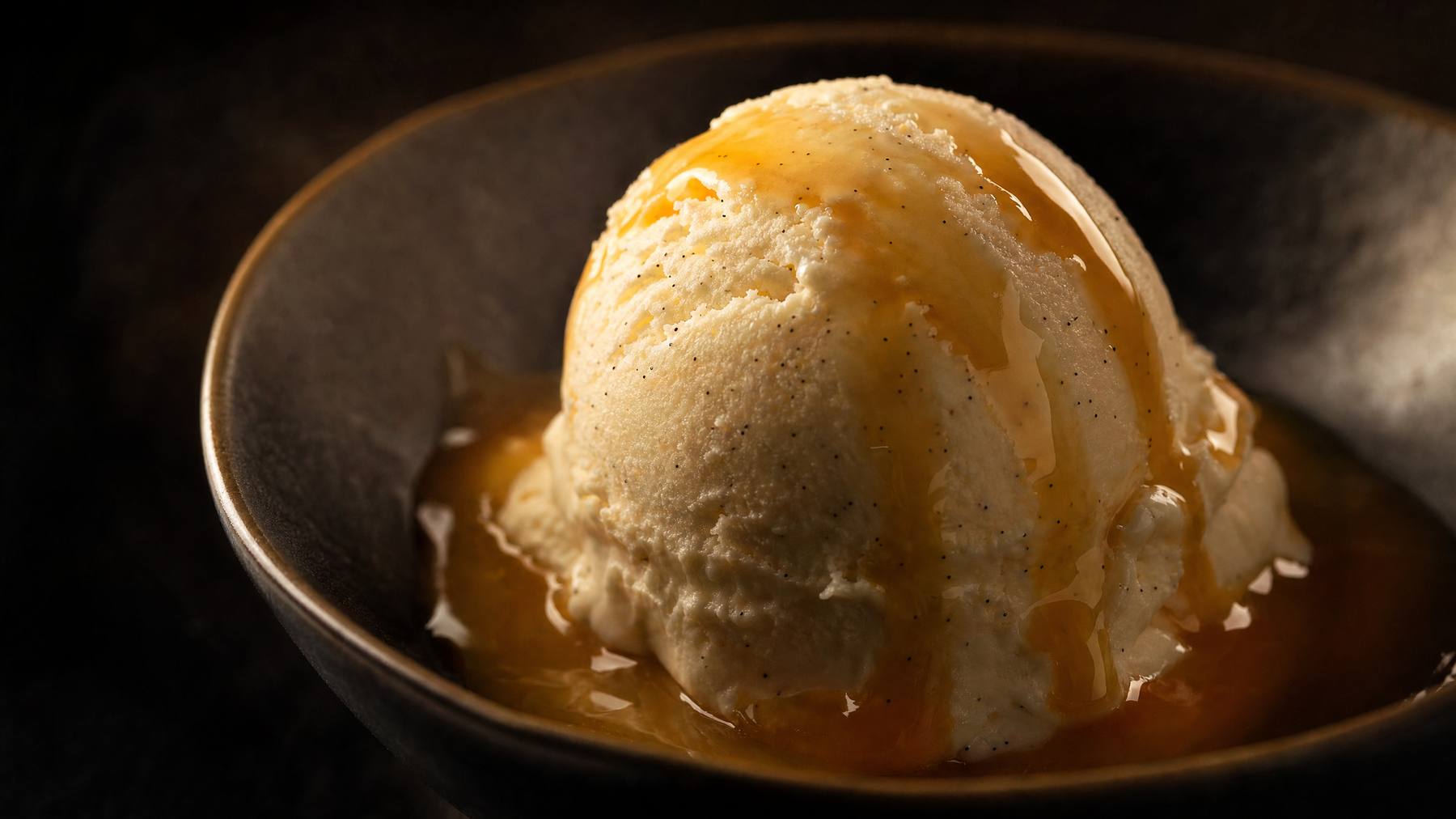 A scoop of ice cream in a waffle cone