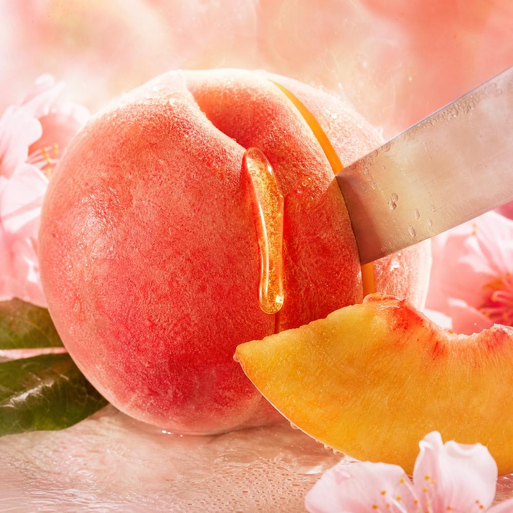 A ripe peach sliced with honey